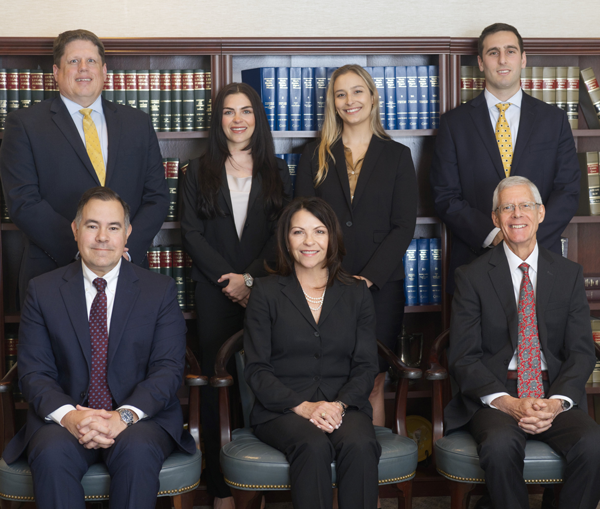Group Photo of professionals at MacLean and Ema, P.A.